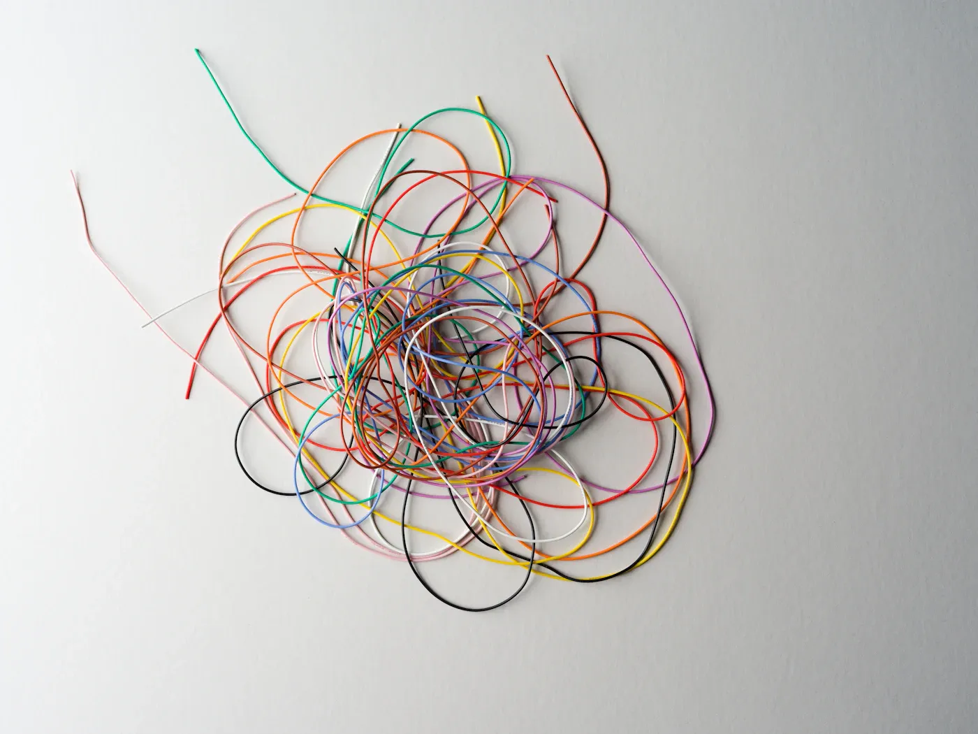 What Are Core Beliefs and How Do They Shape You? Tangled threads, illustrating what are core beliefs
